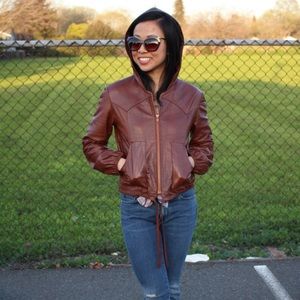 Vintage leather jacket with hood.